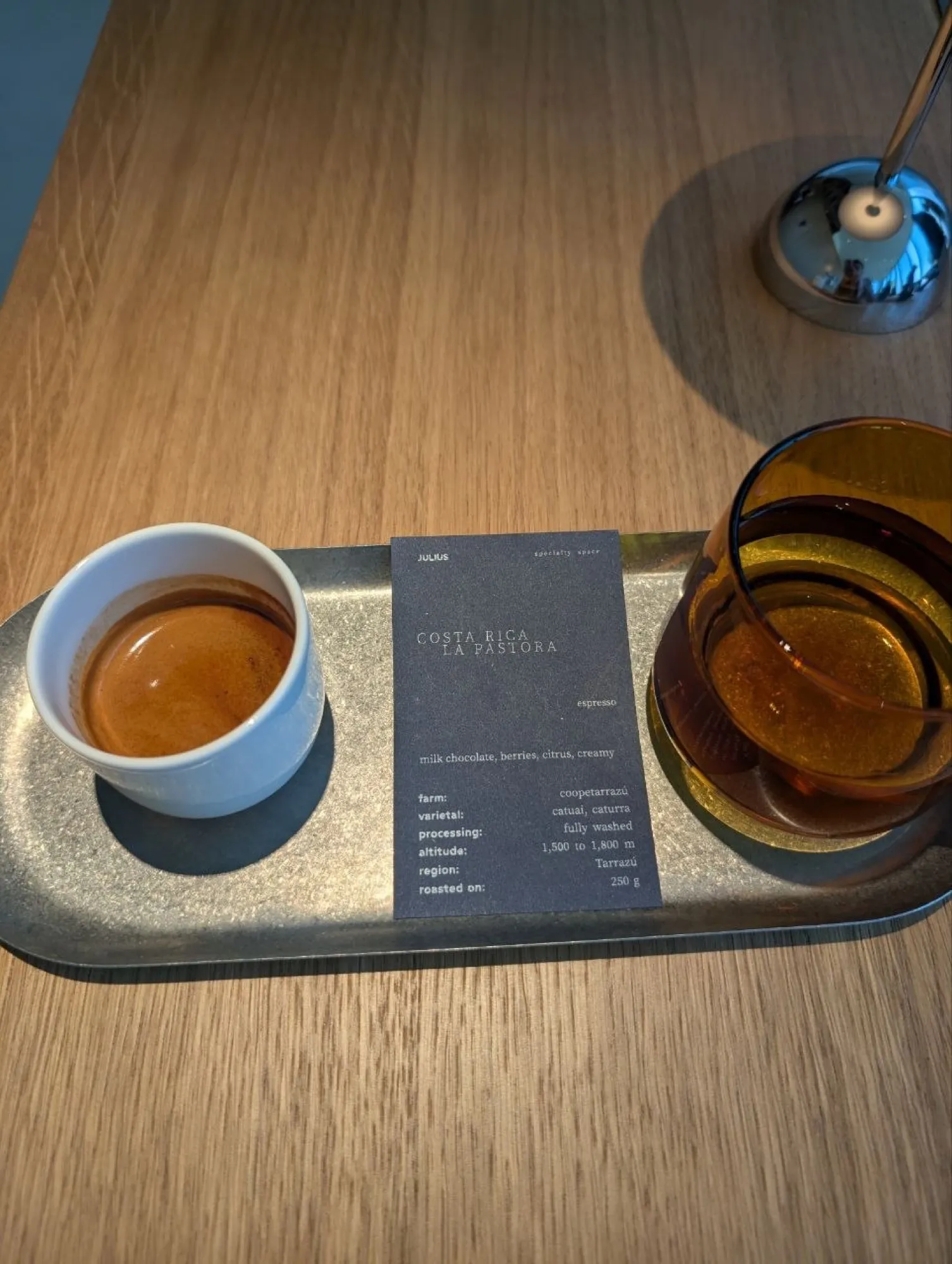 Espresso at Julius on Nazarbayev, beside the bean card for Costa Rica La Pastora from Tarrazu